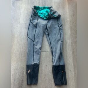 Lululemon Speed Tight leggings in black and grey stripe with zip ankles